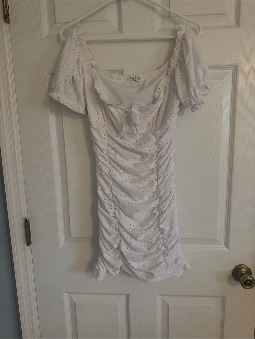 White Eyelet Ruched Mini Dress with Puff Sleeves and Tie Neck